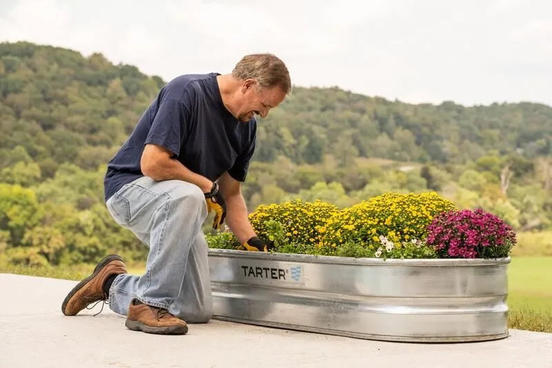 Tarter’s Oval Dura 70 planter trough being used for flower garden.