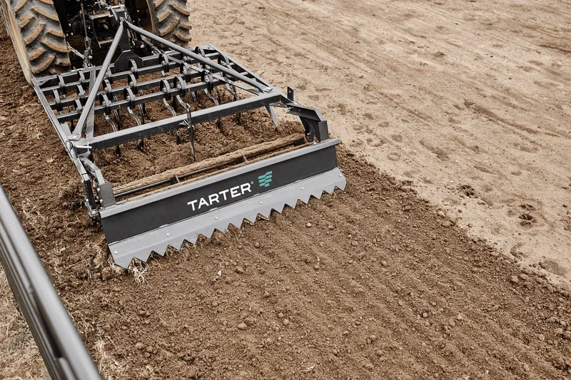 Tarter’s 300 Series 7’ Arena Drag being used to smooth arena to desired footing.